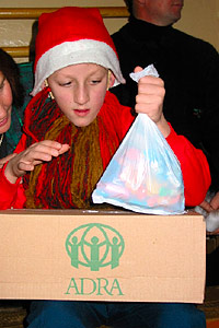 Orphan girl receives ADRA Christmas gifts
