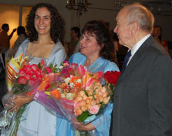 Zita Kirsnauskaite, center, at a poetry reading earlier this year. The Lithuanian Adventist poet, who now resides in Chicago, has released a bilingual version of her fifth collection. [Photo: courtesy Kirsnauskaite]